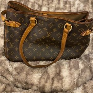 Louis Vuitton shoulder bag.